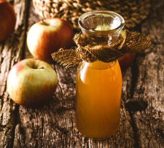 Photo of a homemade apple cider vinegar solution for indoor flea control